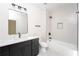 Modern bathroom with white subway tile, black fixtures, and a floating vanity at 17 Rockyford Ne Rd, Atlanta, GA 30317