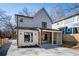 Stylish home with a covered patio, driveway, and fenced yard at 17 Rockyford Ne Rd, Atlanta, GA 30317