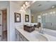 Modern bathroom with double vanity, quartz countertop and large mirror at 1934 Asher Ln # 060, Conyers, GA 30013