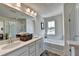 Elegant bathroom with double vanity, garden tub, and shower at 1934 Asher Ln # 060, Conyers, GA 30013