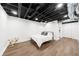 Finished basement bedroom with wood-look flooring at 2010 Sturbridge Ln, Buford, GA 30519