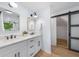 Modern bathroom with double vanity and a walk-in shower at 2010 Sturbridge Ln, Buford, GA 30519