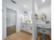 Elegant bathroom with double vanity and separate vanity area at 2010 Sturbridge Ln, Buford, GA 30519