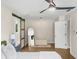 Bedroom with a barn door leading to a large closet at 2010 Sturbridge Ln, Buford, GA 30519