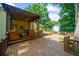 Deck with pergola and built-in outdoor kitchen at 2010 Sturbridge Ln, Buford, GA 30519