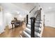 Elegant dining room with hardwood floors adjacent to the staircase at 2010 Sturbridge Ln, Buford, GA 30519