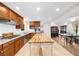 Eat-in kitchen with stainless steel appliances and butcher block island at 2010 Sturbridge Ln, Buford, GA 30519