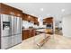 Modern kitchen with stainless steel appliances and butcher block island at 2010 Sturbridge Ln, Buford, GA 30519