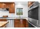 Modern kitchen with stainless steel appliances and granite countertops at 2010 Sturbridge Ln, Buford, GA 30519