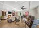 Cozy living room with fireplace, built-in shelves, and hardwood floors at 2010 Sturbridge Ln, Buford, GA 30519