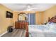 Bright bedroom featuring a comfortable bed and large TV at 2326 Nicole Dr, Hampton, GA 30228