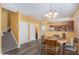 Charming dining area adjacent to the kitchen and living room at 2326 Nicole Dr, Hampton, GA 30228