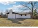 House backyard view, showcasing a large grassy area at 140 Lake Dr, Fayetteville, GA 30215