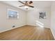 Spacious bedroom featuring wood-look floors and a ceiling fan at 140 Lake Dr, Fayetteville, GA 30215