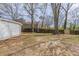 Open backyard with established trees and new wooden fence at 161 Adair Se Ave, Atlanta, GA 30315