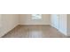 Light-filled bedroom features new paint and luxury vinyl plank flooring throughout at 161 Adair Se Ave, Atlanta, GA 30315