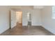Spacious bedroom with hardwood flooring and access to ensuite bathroom at 161 Adair Se Ave, Atlanta, GA 30315