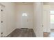 Bright entryway with a white door and trim and luxury vinyl plank flooring throughout at 161 Adair Se Ave, Atlanta, GA 30315