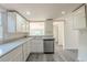 Well-equipped kitchen with stainless steel appliances, ample countertop space, and new flooring at 161 Adair Se Ave, Atlanta, GA 30315