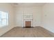 Empty living room with doors and fireplace at 161 Adair Se Ave, Atlanta, GA 30315