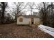 Side view of renovated cottage, showcasing new deck at 2064 Chicago Nw Ave, Atlanta, GA 30314