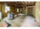 Spacious interior view of a home in progress showing exposed framing and modern design elements at 2064 Chicago Nw Ave, Atlanta, GA 30314