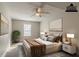 Virtually staged bedroom with a king-size bed and window at 2675 Park Ave, Austell, GA 30106