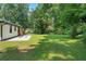 Large backyard with patio, providing extra outdoor space at 4291 Lamar St, Decatur, GA 30035