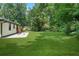 Large backyard with patio, providing extra outdoor space at 4291 Lamar St, Decatur, GA 30035