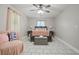 Bright bedroom with a queen-size bed and plenty of natural light at 4291 Lamar St, Decatur, GA 30035