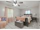 Spacious bedroom with a ceiling fan and neutral color scheme at 4291 Lamar St, Decatur, GA 30035