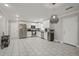 Modern kitchen with white cabinets, granite countertops, and stainless steel appliances at 4291 Lamar St, Decatur, GA 30035