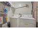 Laundry room with washer, dryer, and water heater at 4291 Lamar St, Decatur, GA 30035