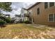 Spacious backyard with a combination of lawn and patio area for outdoor enjoyment at 101 Chestnut Dr, Canton, GA 30114