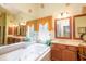 Spa-like bathroom with soaking tub and double vanity at 101 Chestnut Dr, Canton, GA 30114