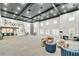Spacious clubhouse with high ceilings, elegant seating areas, and a refreshment area for gatherings at 101 Chestnut Dr, Canton, GA 30114