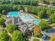 Aerial view of the neighborhood pool, slides, splashpad and various lounge areas for residents to enjoy at 101 Chestnut Dr, Canton, GA 30114