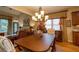 Bright dining room with hardwood floors and a chandelier at 101 Chestnut Dr, Canton, GA 30114