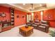 Entertaining home theater with a projector screen, recliners, and custom wall decor at 101 Chestnut Dr, Canton, GA 30114