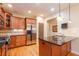 Modern kitchen featuring stainless steel appliances, granite countertops, and wood cabinets at 101 Chestnut Dr, Canton, GA 30114