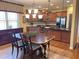 Eat-in kitchen features stainless steel appliances, granite countertops, and custom wood cabinetry at 101 Chestnut Dr, Canton, GA 30114