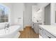 Elegant bathroom with soaking tub and double vanity at 160 Lofty Eagle Ln, Fayetteville, GA 30214