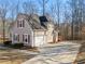 House exterior showcasing a garage and driveway at 160 Lofty Eagle Ln, Fayetteville, GA 30214