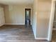 Living room features vinyl flooring and a doorway to the next room at 1820 Arkose Dr, Atlanta, GA 30316