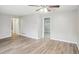 Living room with hardwood floors and access to other rooms at 1820 Arkose Dr, Atlanta, GA 30316