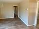 Inviting room boasts neutral walls, wood floors, and doorway leading to other rooms at 1820 Arkose Dr, Atlanta, GA 30316