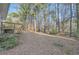 Large backyard with mature trees and deck at 2536 Nw Ridgecrest Nw Dr, Kennesaw, GA 30152