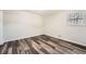 Spacious bedroom with neutral walls and wood-look flooring at 2536 Nw Ridgecrest Nw Dr, Kennesaw, GA 30152