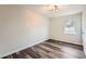 Well-lit bedroom with a ceiling fan and neutral decor at 2536 Nw Ridgecrest Nw Dr, Kennesaw, GA 30152