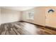 Bright living room featuring wood-look floors and a window at 2536 Nw Ridgecrest Dr Nw, Kennesaw, GA 30152